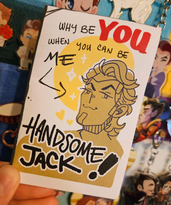 A folded zine that says &quot;why be YOU when you can be ME: HANDSOME JACK!&quot; with the idiot asshole Jack&#39;s smug face