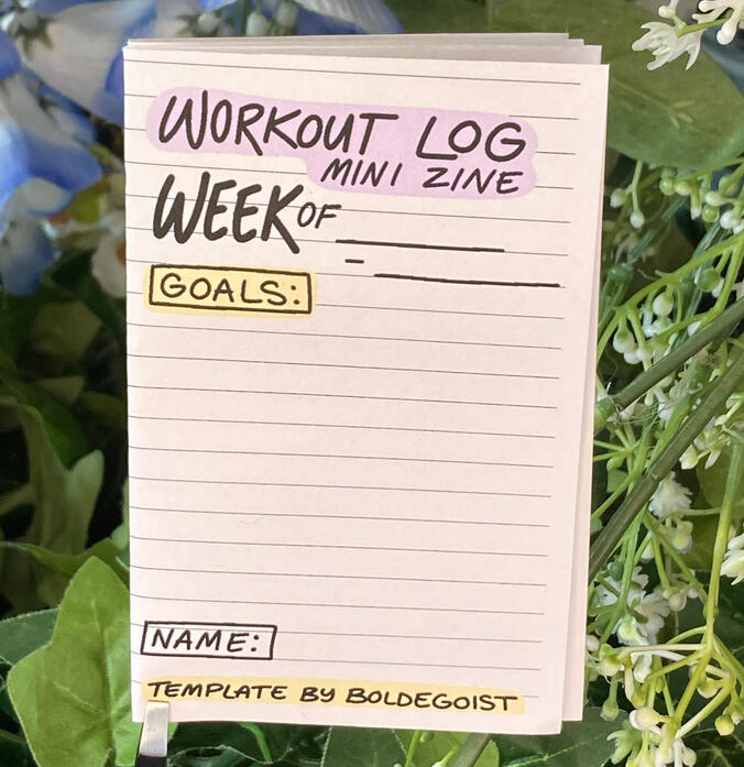 A folded zine that says &quot;MEOW MEOW&quot; above a oblong frame. The inside of the frame reads &quot;A D.I.Y. activity book zine. PARENTHESIS: paste a photo of your meow meow here.)&quot;